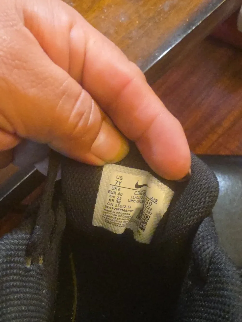 Nike Kids Black Sneakers with White Swoosh